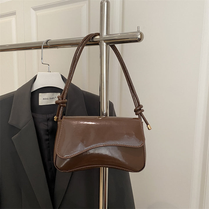 Damen elegante Handtasche mit geschwungenem Design Nord Taschen