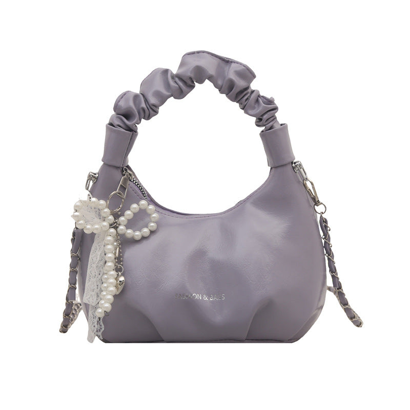 Damen elegante Handtasche mit dekorativen Perlenakzenten Nord Taschen