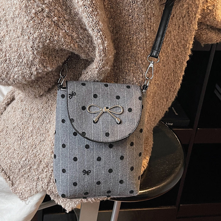 Damen Umhängetasche mit verspieltem Punktemuster und dekorativem Schleifendetail Nord Taschen