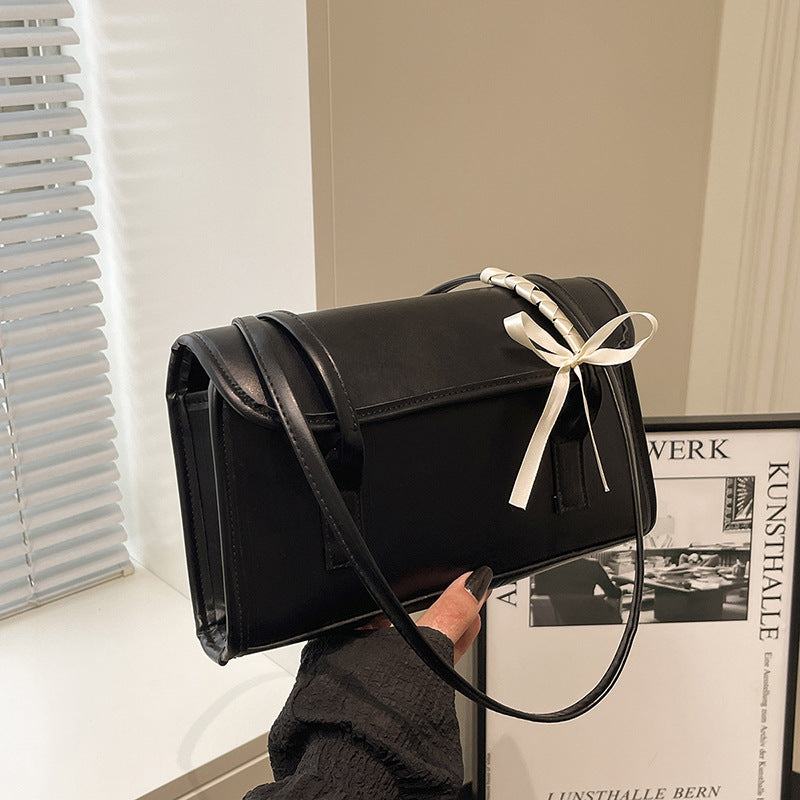 Damen Handtasche aus hochwertigem Kunstleder mit verspieltem Schleifendetail Nord Taschen