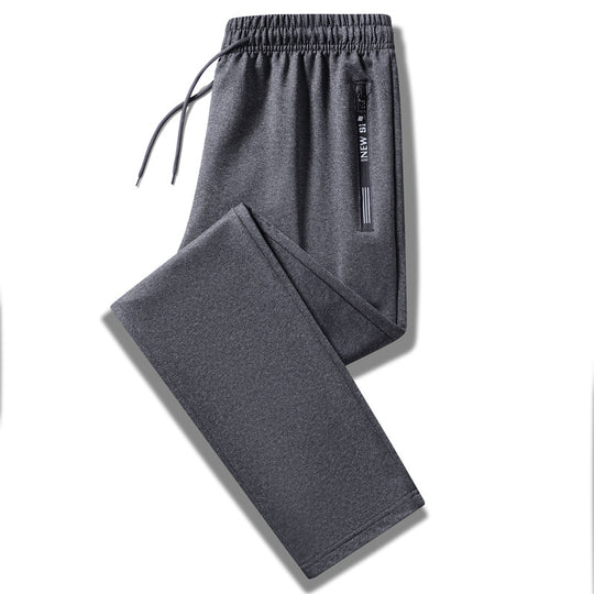 Herren Sportliche Trainingshose mit elastischem Tunnelzugbund, Reißverschlusstasche und glattem Performance‑Material Nord Taschen