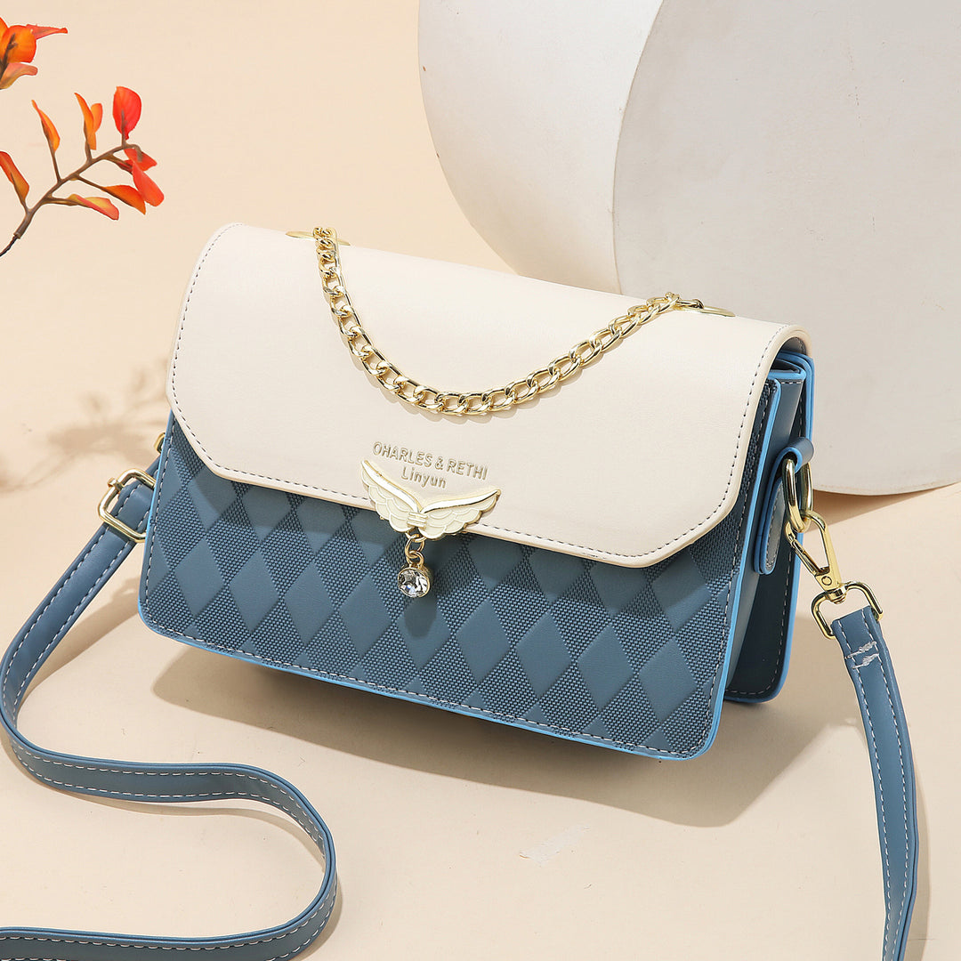 Damen Schultertasche mit elegantem Karomuster und goldener Kette Nord Taschen