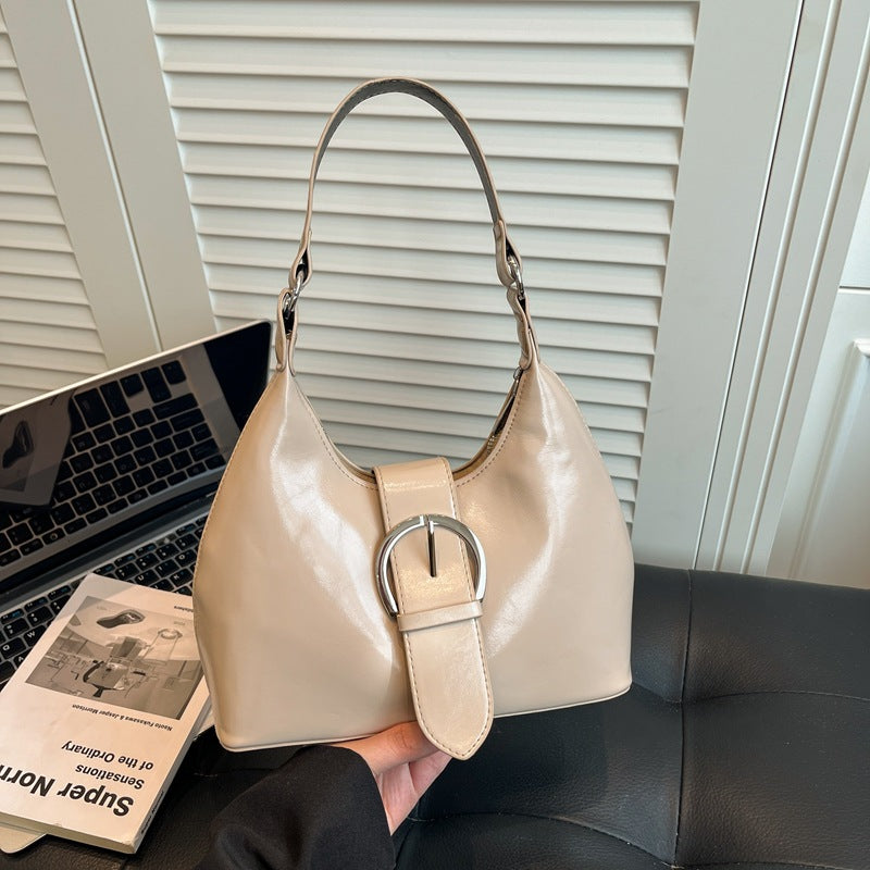 Damen Hobo-Tasche mit elegantem Gurtverschluss und glänzender Oberfläche Nord Taschen