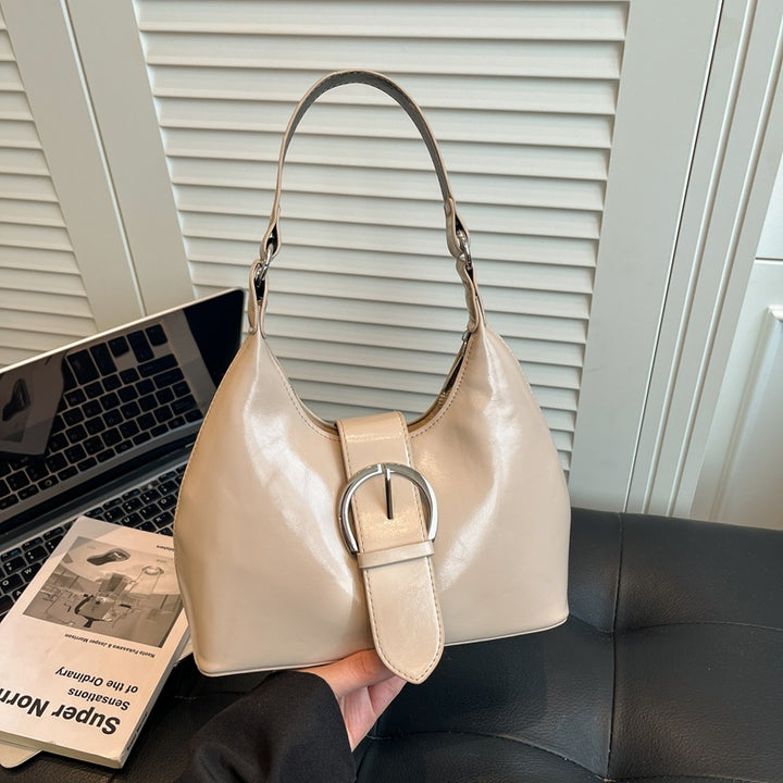 Damen Hobo-Tasche mit elegantem Gurtverschluss und glänzender Oberfläche Nord Taschen