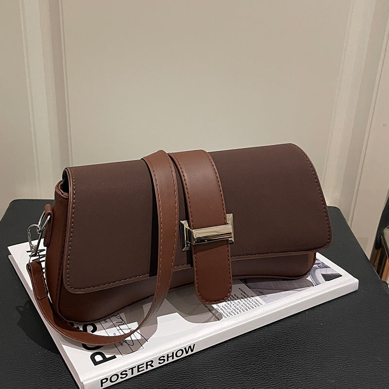 Damen elegante Umhängetasche mit hochwertiger Lederoberfläche und stilvollem Verschluss Nord Taschen