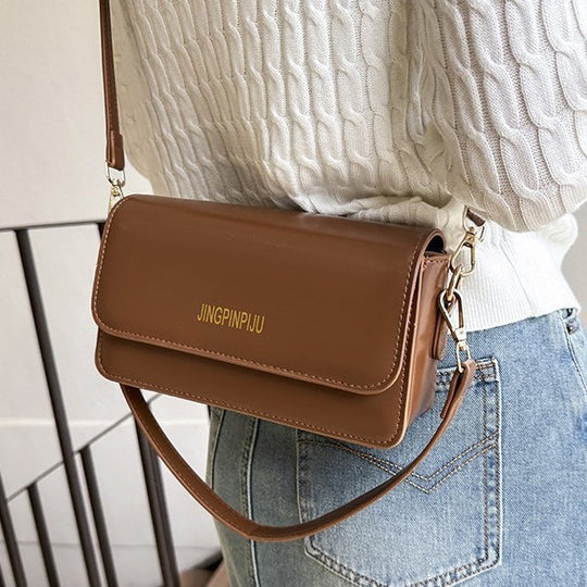 Damen Umhängetasche mit hochwertigem Kunstleder und elegantem Klappenverschluss Nord Taschen