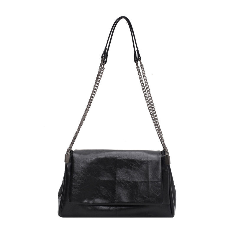Damen Schultertasche mit eleganter Kettenverzierung und weicher Lederoberfläche Nord Taschen