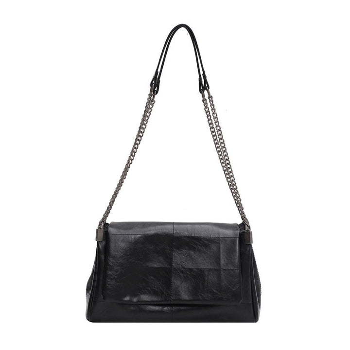 Damen Schultertasche mit eleganter Kettenverzierung und weicher Lederoberfläche Nord Taschen