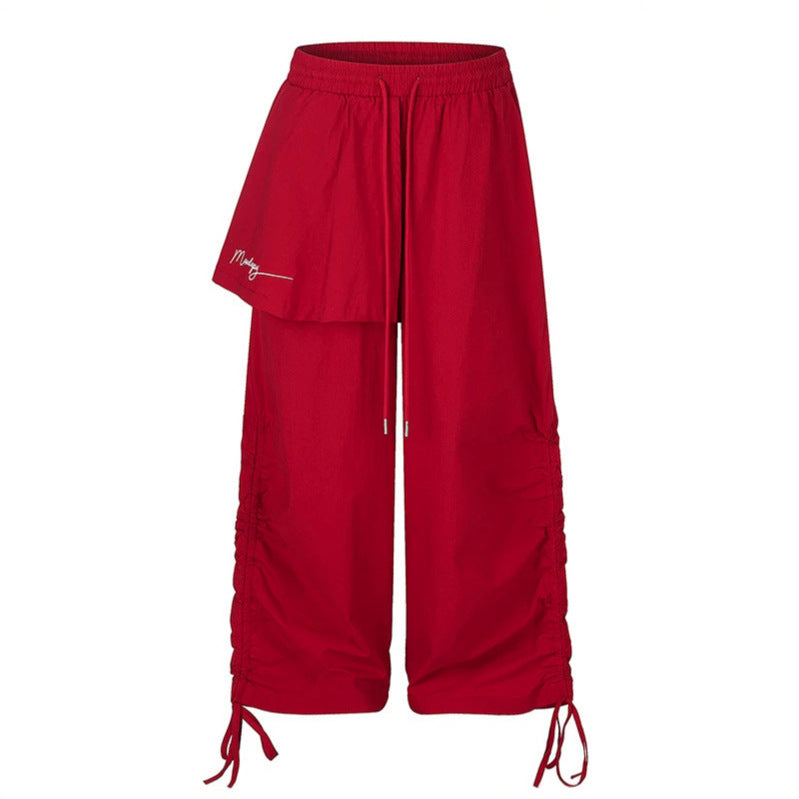 Damen Weite Capri-Hose mit Tunnelzug, seitlicher Raffung und asymmetrischer Überlagerung Nord Taschen