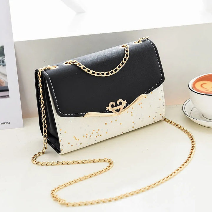 Damen elegante Umhängetasche mit glänzenden Akzenten Nord Taschen