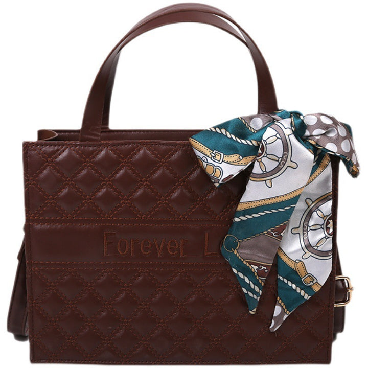 Damen elegante Handtasche mit modernen Details und dekorativem Schal Nord Taschen