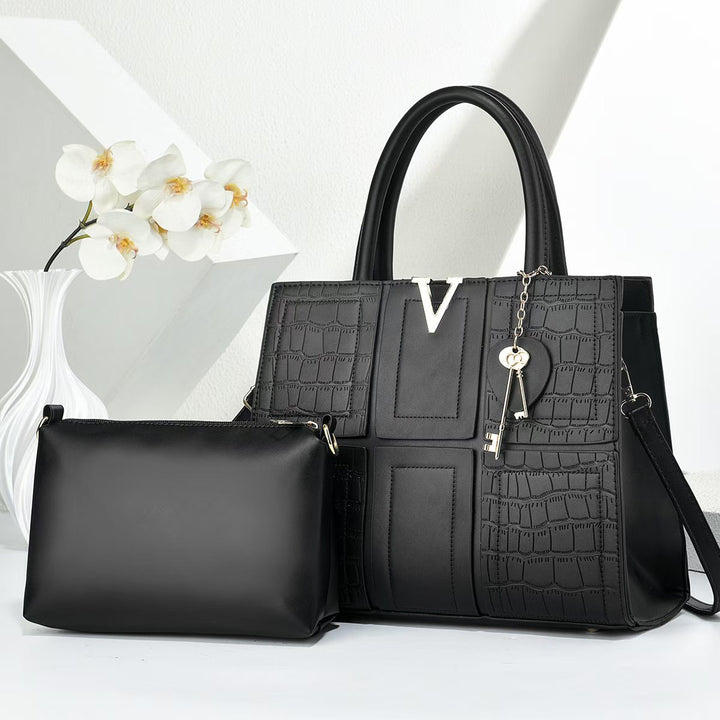 Damen Handtasche mit eleganter Kroko-Prägung und abnehmbarer Kosmetiktasche Nord Taschen