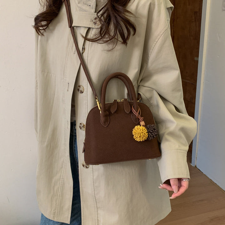 Damen Handtasche mit eleganten Quasten Nord Taschen