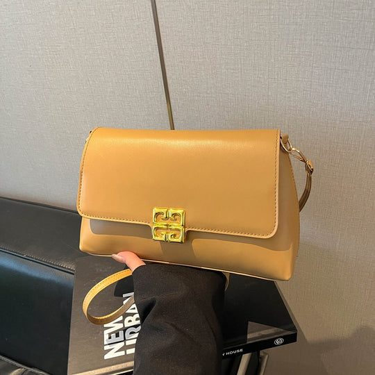 Damen Umhängetasche mit elegantem Klappverschluss und luxuriösen Details Nord Taschen