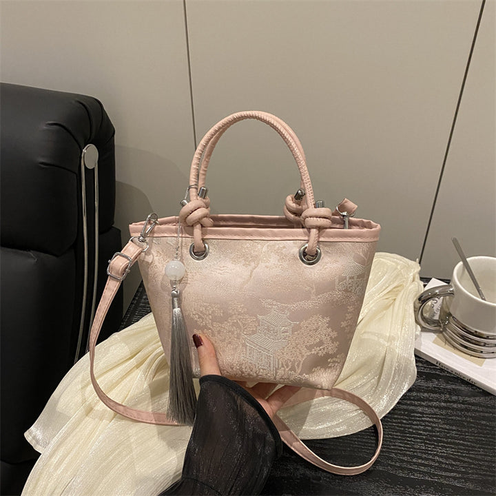 Damen elegante Umhängetasche mit floralem Design und kunstvollen Details Nord Taschen