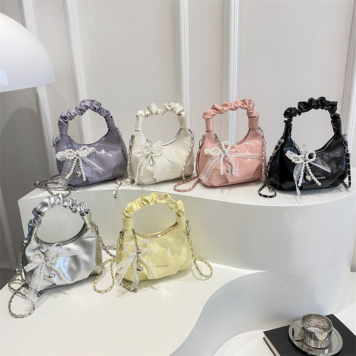Damen elegante Handtasche mit dekorativen Perlenakzenten Nord Taschen
