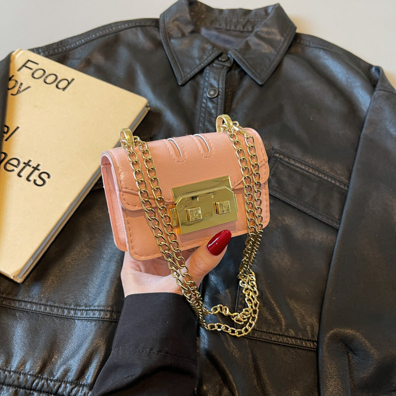 Damen elegante Mini-Handtasche mit goldener Verschlussmechanik Nord Taschen