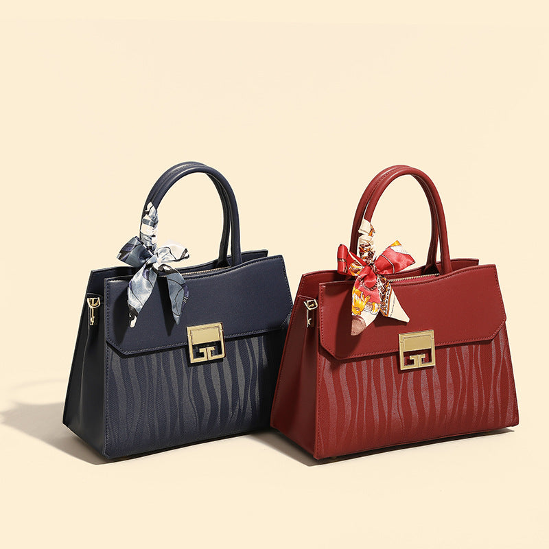 Damen Handtasche mit verstellbarem Schulterriemen und elegantem Schleifenakzent Nord Taschen