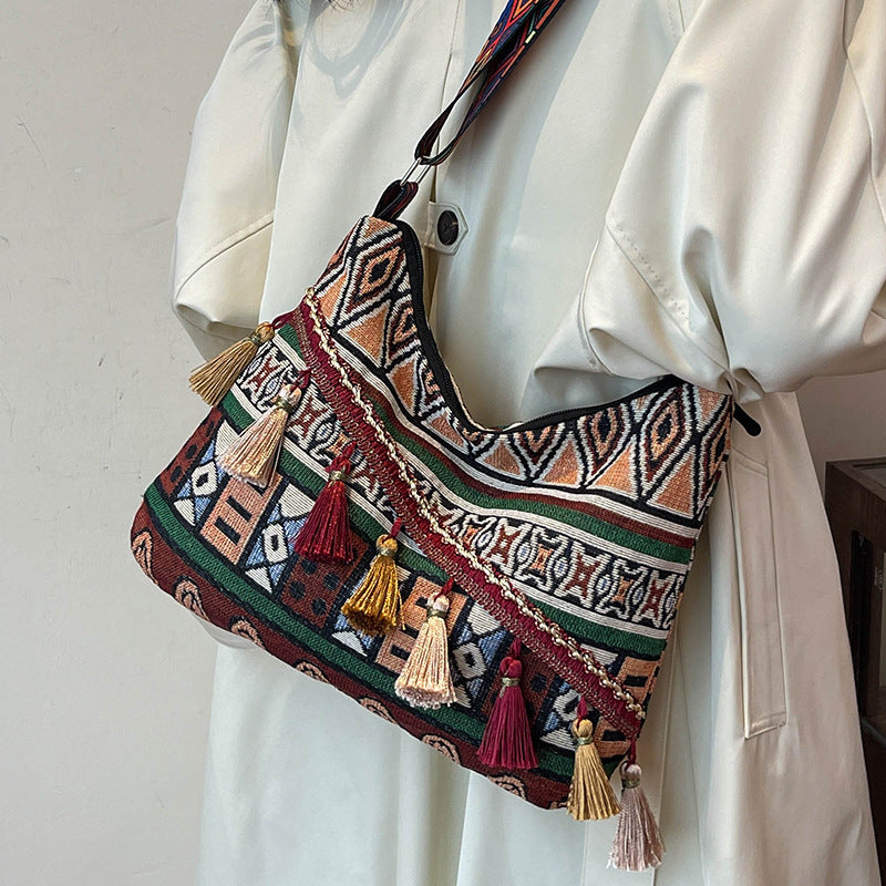 Damen Umhängetasche mit kunstvollem ethnischen Muster und dekorativen Quasten Nord Taschen