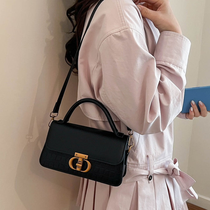 Damen elegante Handtasche mit strukturierter Oberfläche und glänzendem Verschluss Nord Taschen