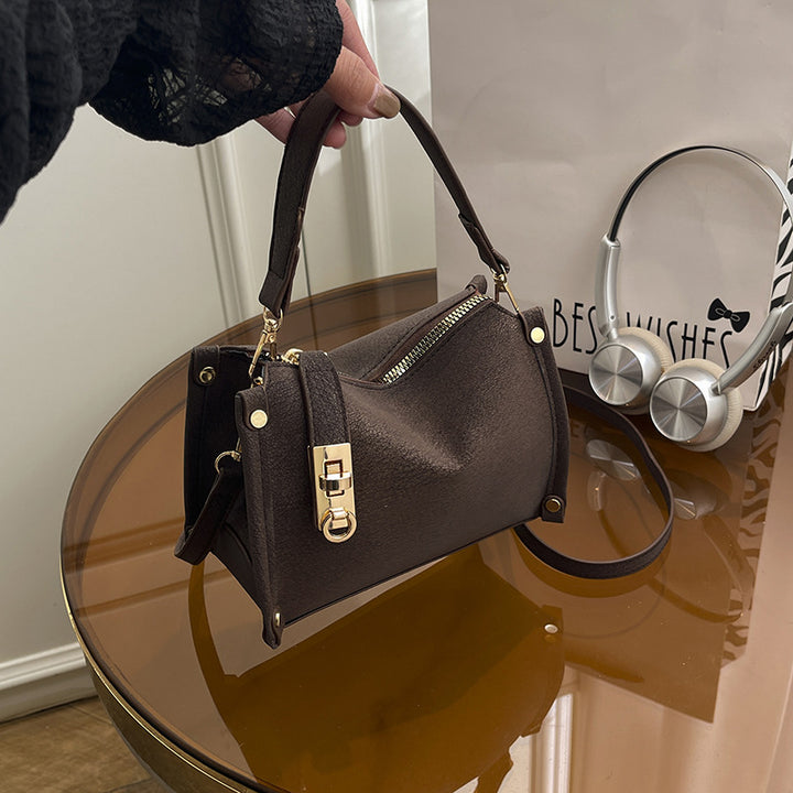 Damen Handtasche mit elegantem Reißverschluss und modernem Detail Nord Taschen