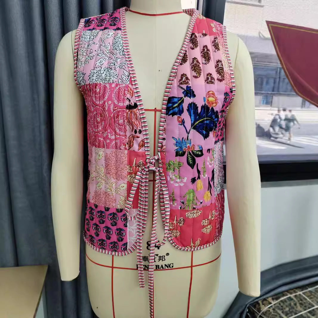 Damen Patchwork‑Weste mit Bindeband, gestreifter Innenverarbeitung und Kontrastpaspel Nord Taschen
