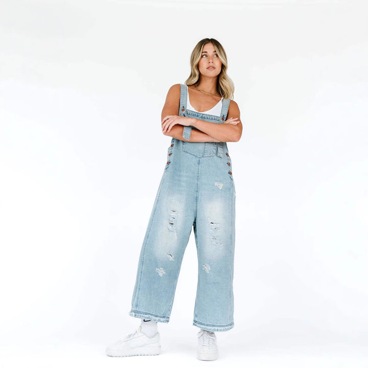 Damen lässige verwaschene Latzhose aus Jeansstoff mit Rissen und weitem Bein Nord Taschen