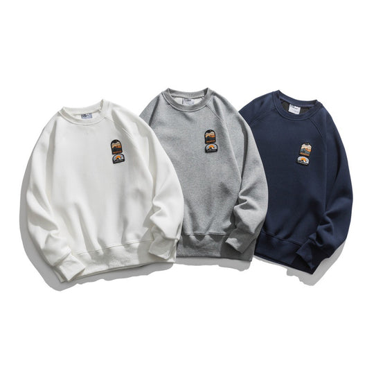 Unisex Oversize-Sweatshirt mit Raglanärmeln und Berg-Patch Nord Taschen