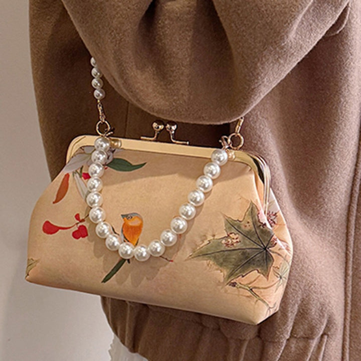 Damen elegante Handtasche mit zartem Blumendruck und Perlenkette Nord Taschen