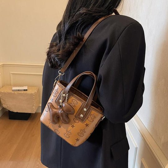 Damen Mini-Handtasche mit verspieltem Anhänger | Nord Taschen