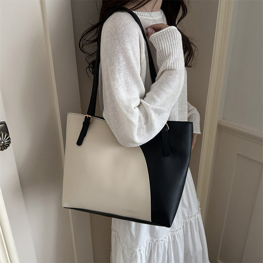 Damen elegante Handtasche mit asymmetrischem Design und robusten Trageriemen Nord Taschen