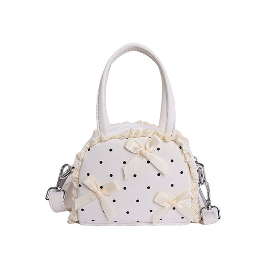 Damen modische Handtasche im verspielt romantischen Design mit Schleifenakzenten Nord Taschen