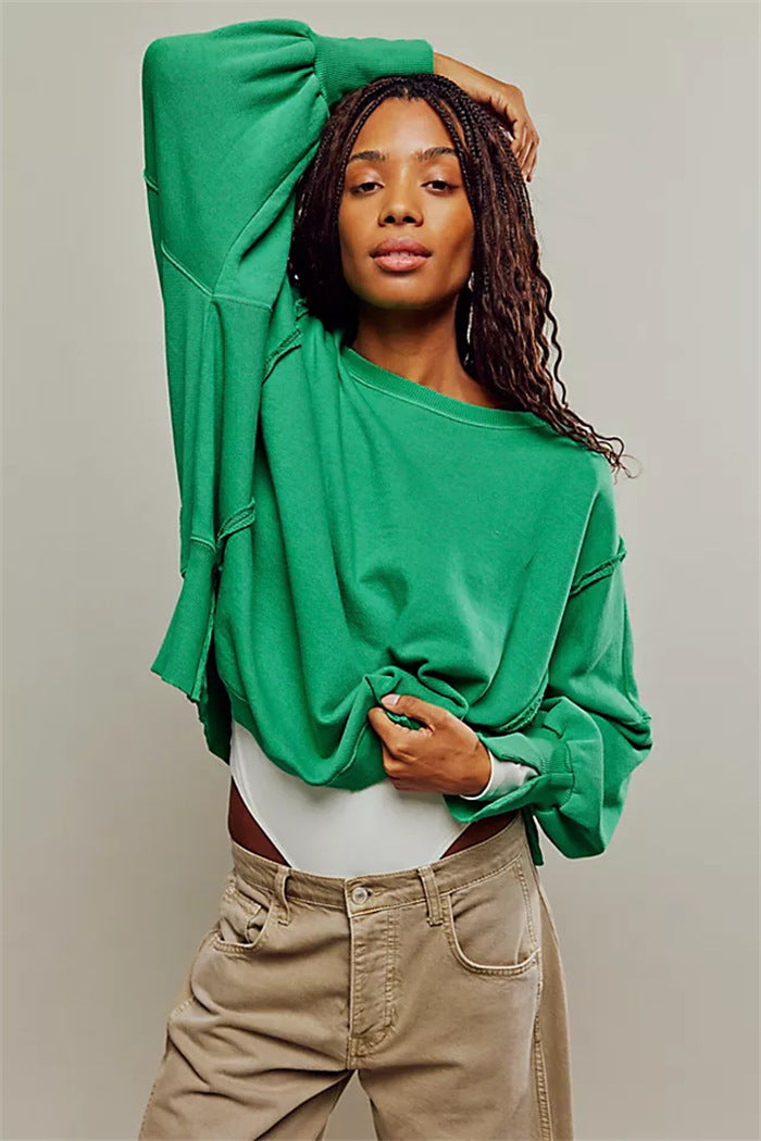 Damen oversized Sweatshirt mit Ballonärmeln, offenen Saumnähten und seitlichen Schlitzen Vittorelli
