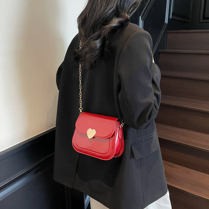 Damen elegante Umhängetasche mit Herzverschluss Nord Taschen