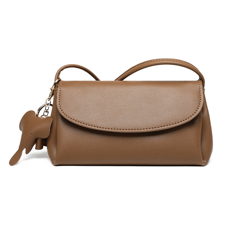 Damen Clutch-Tasche mit eleganter Klappenöffnung und charmantem Anhänger Nord Taschen
