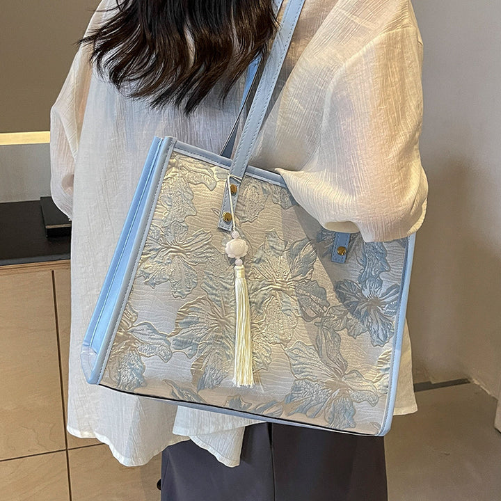 Damen Tragetasche mit floralem Stickdesign und elegantem Quastenanhänger Nord Taschen