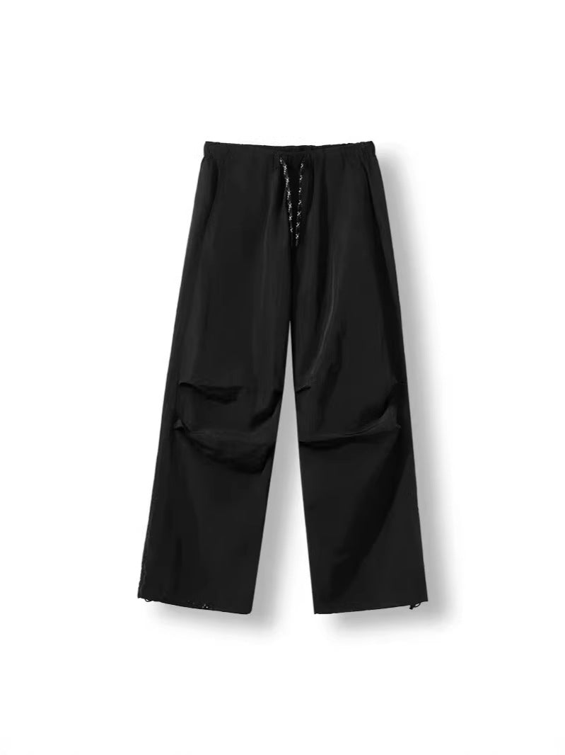Herren Locker geschnittene Nylon-Trackpants mit Kordelzug, aufgesetzten Taschen und gerader Wide‑Leg-Passform Nord Taschen