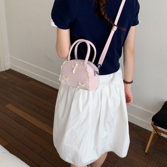 Damen modische Handtasche im verspielt romantischen Design mit Schleifenakzenten Nord Taschen