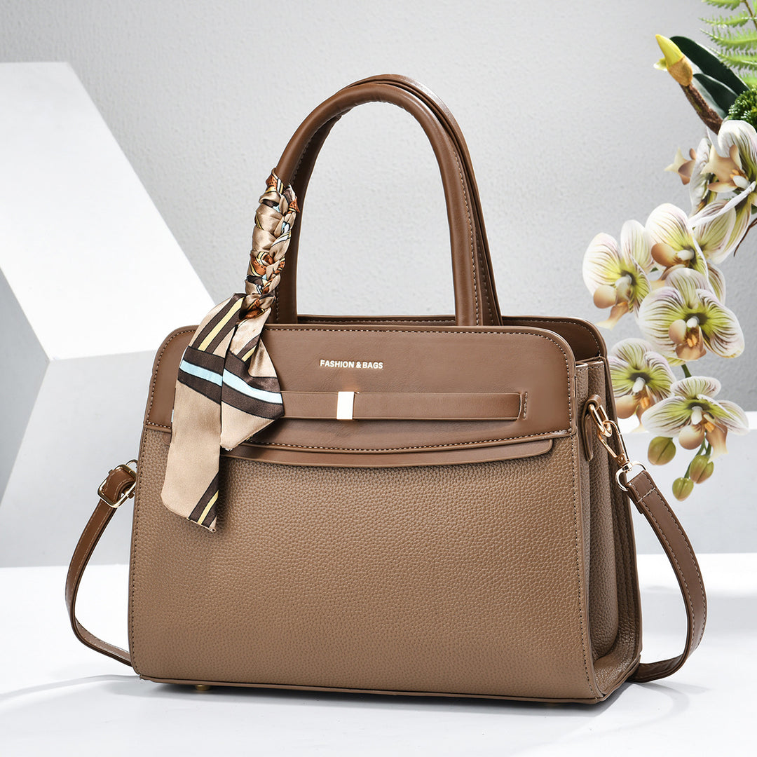 Damen elegante Handtasche mit praktischen Fächern und verspieltem Schal Nord Taschen