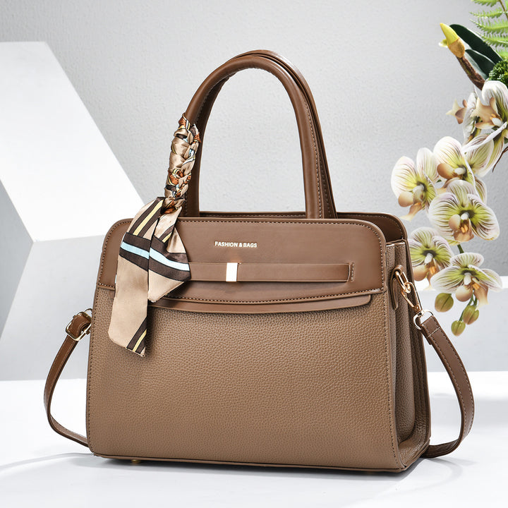 Damen elegante Handtasche mit praktischen Fächern und verspieltem Schal Nord Taschen