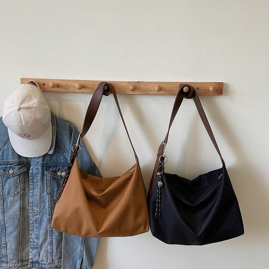 Damen elegante Hobo-Tasche mit weichem Leder und trendigem Detail Nord Taschen