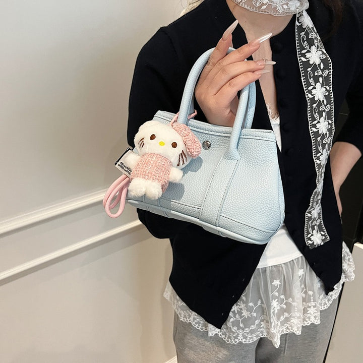 Damen Mini-Handtasche mit verspieltem Plüsch-Anhänger Nord Taschen