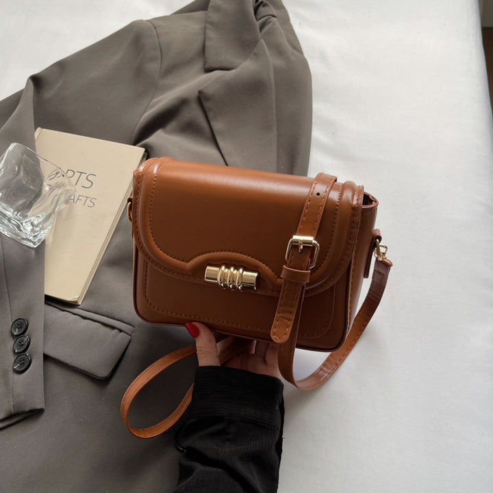 Damen elegante Umhängetasche mit strukturiertem Design und goldfarbenem Verschluss Nord Taschen