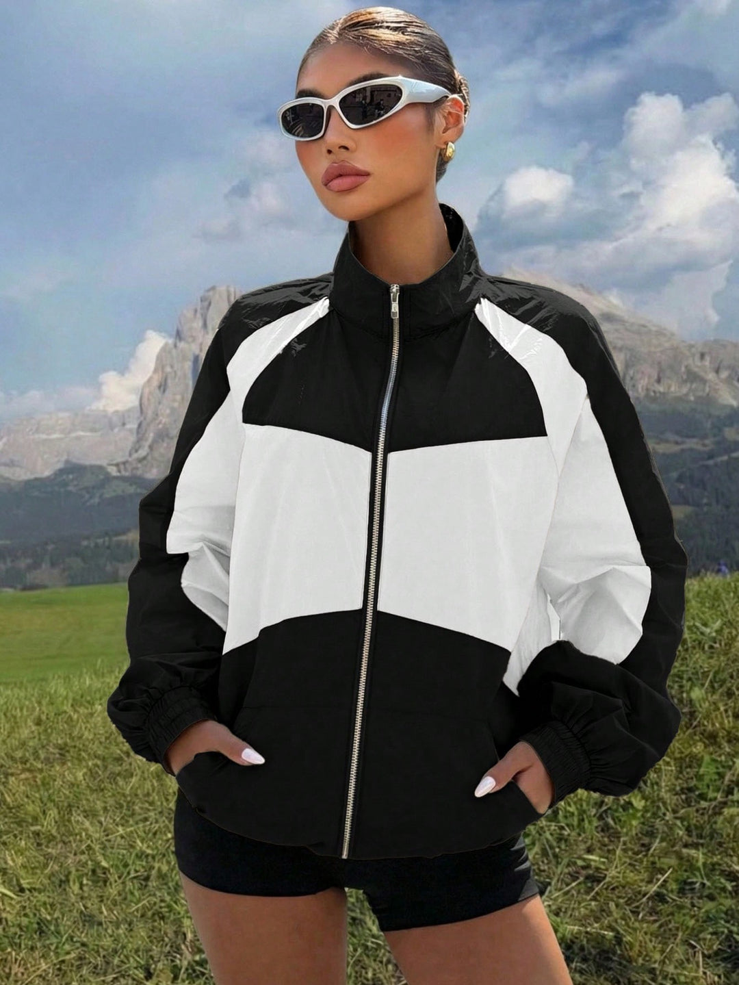 Damen Leichte Windbreaker‑Jacke mit hohem Stehkragen und Colorblock‑Design Nord Taschen