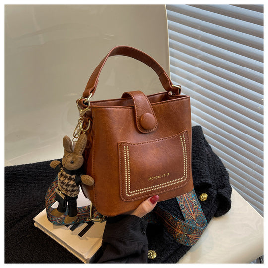 Damen Handtasche im modernen Minimalismus-Stil mit praktischer Außentasche | Nord Taschen