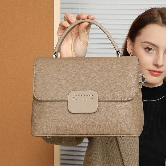 Damen Umhängetasche mit strukturiertem Leder und verstellbarem Schulterriemen Nord Taschen
