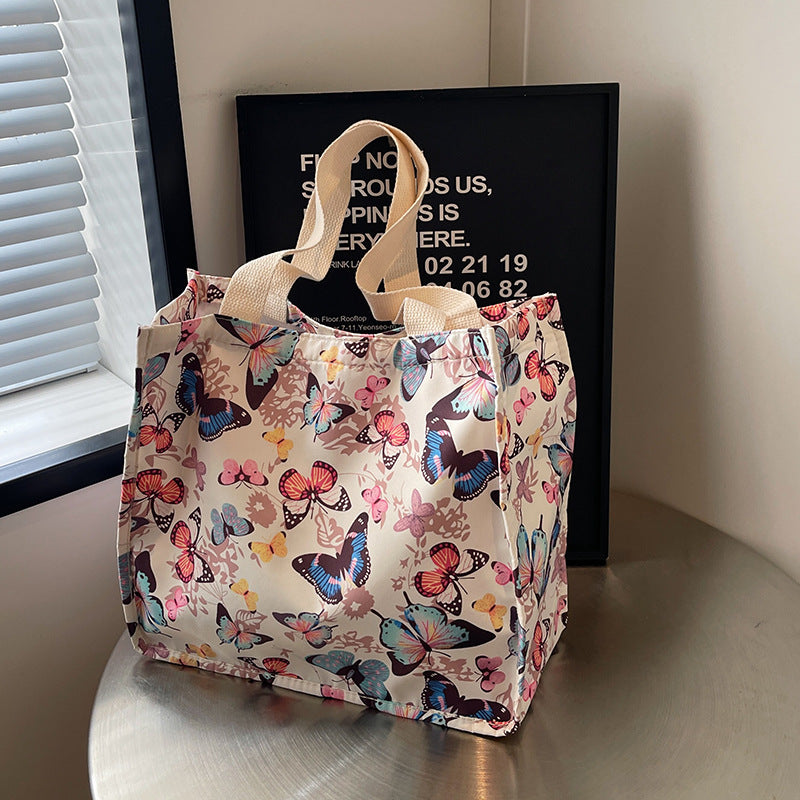 Damen Einkaufstasche mit floralem Schmetterlingsdesign und stabilen Tragegriffen Nord Taschen