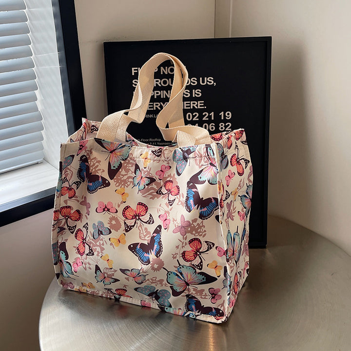 Damen Einkaufstasche mit floralem Schmetterlingsdesign und stabilen Tragegriffen Nord Taschen