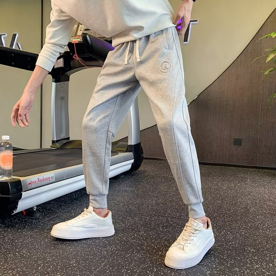 Herren Slim-Tapered Jogginghose aus Baumwollmix mit Bündchen, Tunnelzug und dezenter Logo-Applikation Nord Taschen