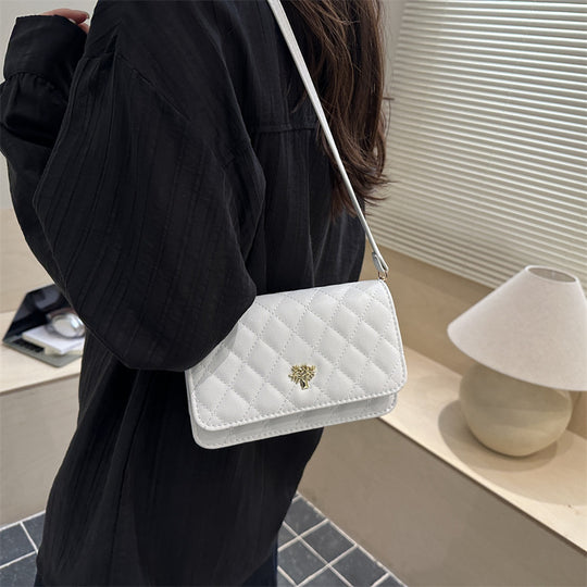Damen Umhängetasche mit eleganter Steppung und goldenen Akzenten Nord Taschen